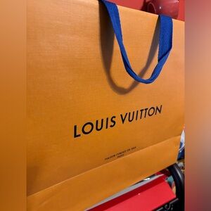 Louis Vuitton large gift shopping bag!!! Only used once to gift me a handbag!